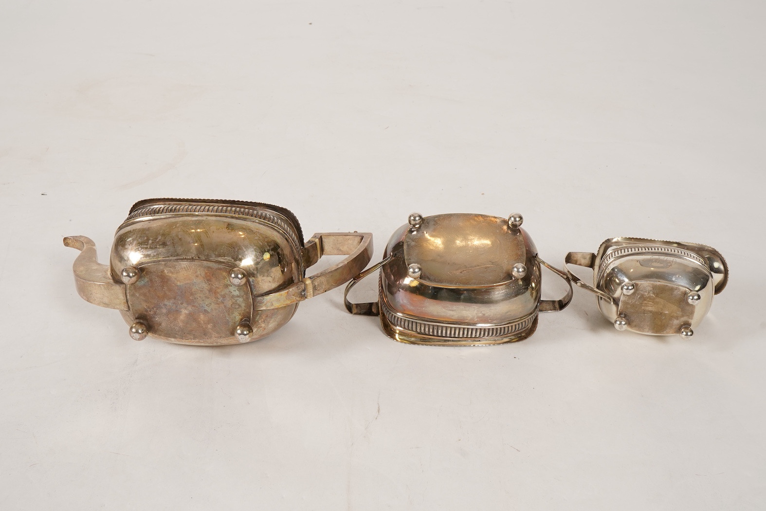 A George III silver three piece tea set, by John Wakefield